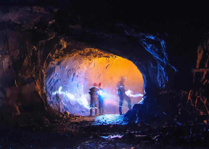 Diggers in a big cave Mining.jpg